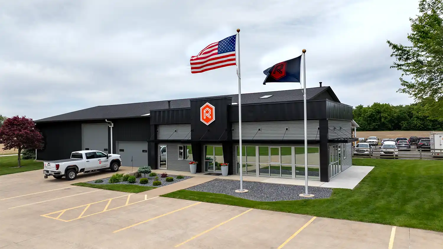 R. Yoder Construction team collaborating in their Northern Indiana office on commercial construction projects